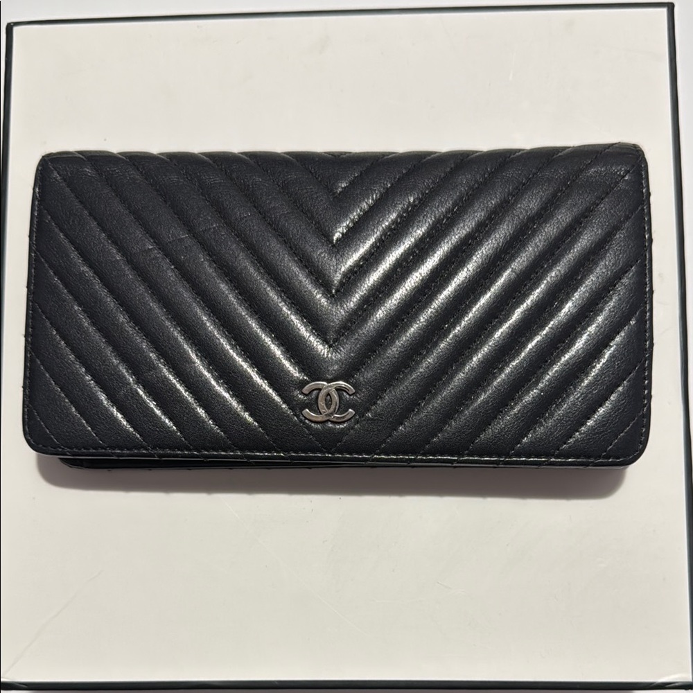 Authentic CHANEL Black Wallet with Elegant Chevron Quilting